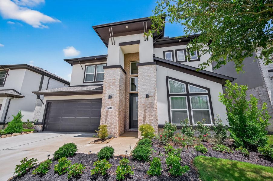 Front exterior of a new home in , Richmond, TX, highlighting curb appeal (Image 2). Front exterior of a new home in , Richmond, TX, highlighting curb appeal (Image 2).