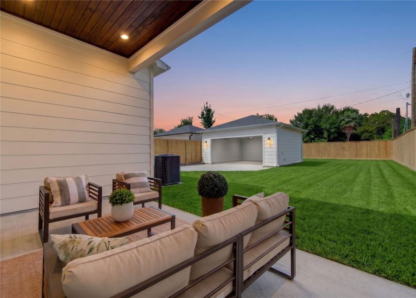 Inviting covered patio overlooking the expansive backyard, offering the perfect setting for alfresco dining, evening cocktails, or relaxing outdoors. The generous lawn provides endless possibilities for a future pool, outdoor kitchen, play area, or beautifully landscaped backyard retreat. Inviting covered patio overlooking the expansive backyard, offering the perfect setting for alfresco dining, evening cocktails, or relaxing outdoors. The generous lawn provides endless possibilities for a future pool, outdoor kitchen, play area, or beautifully landscaped backyard retreat.
