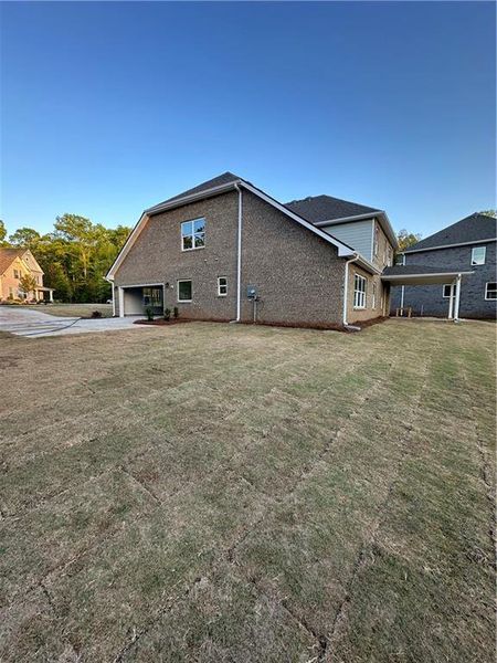 Exterior details and patio area of a home in Mirror Lake at South Harbour, Villa Rica (Image 3).