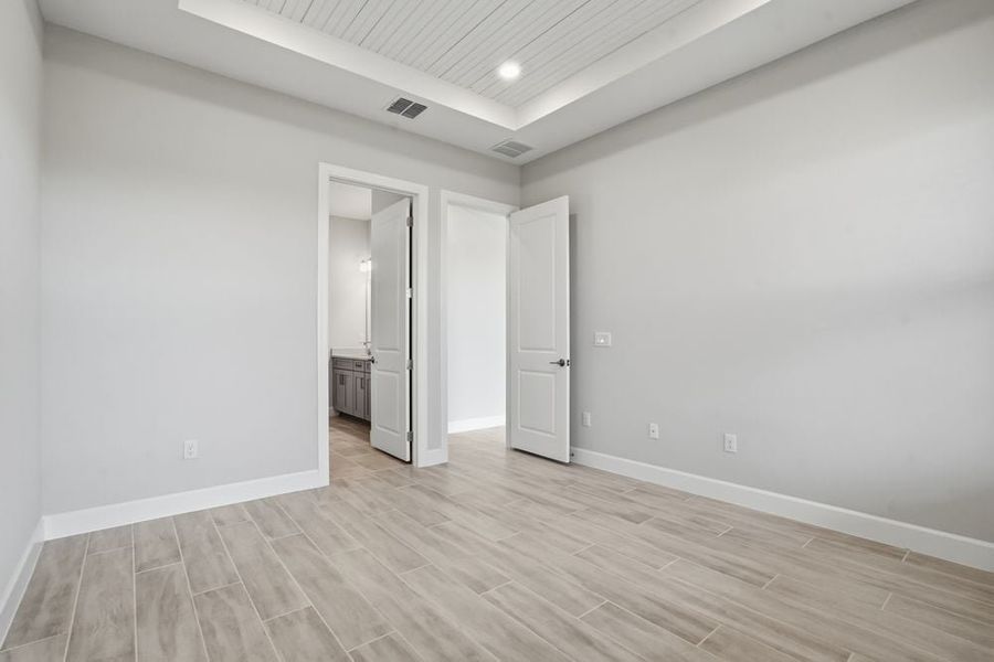 Representative unfurnished interior of a home built from the Monte by Taylor Morrison in Esplanade at McKinnon Groves, Winter Garden (Image 14). Representative unfurnished interior of a home built from the Monte by Taylor Morrison in Esplanade at McKinnon Groves, Winter Garden (Image 14).