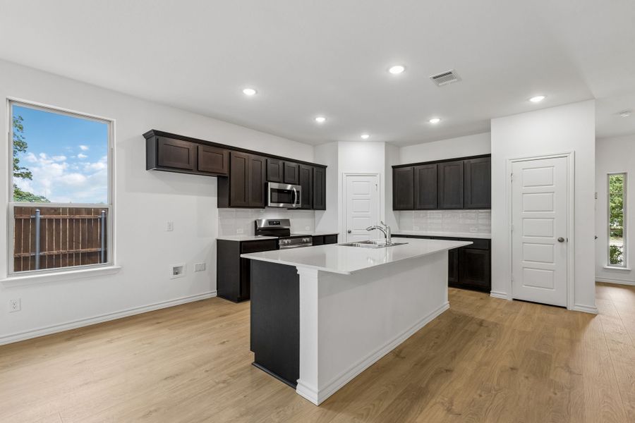 Furnished interior view inside a new home in Eagle Cove, Denton (Image 9).