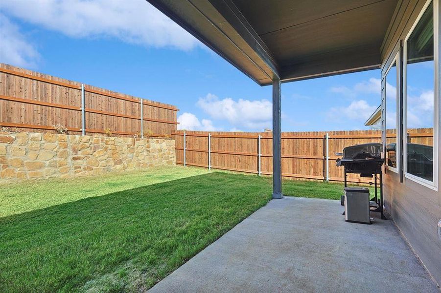 View of yard with a patio area