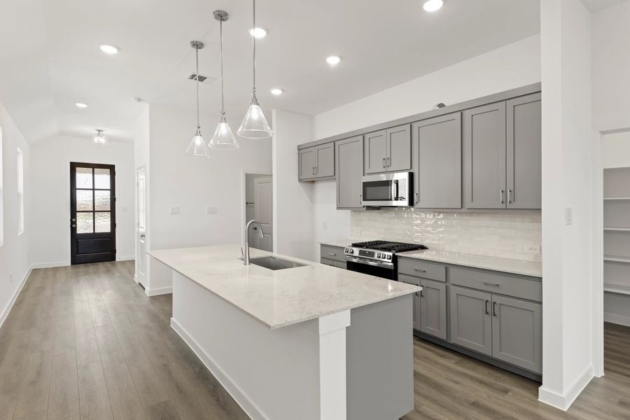 Kitchen featuring the Milan Collection Kitchen featuring the Milan Collection