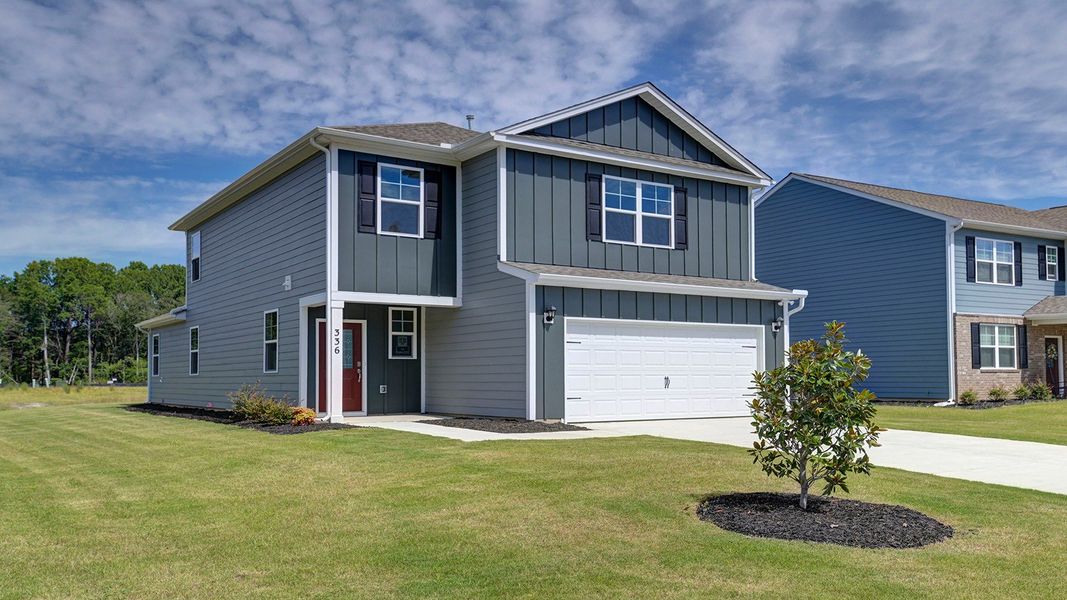 Front exterior of a new home in Sease's Pond, Gilbert, SC, highlighting curb appeal (Image 2). Front exterior of a new home in Sease's Pond, Gilbert, SC, highlighting curb appeal (Image 2).