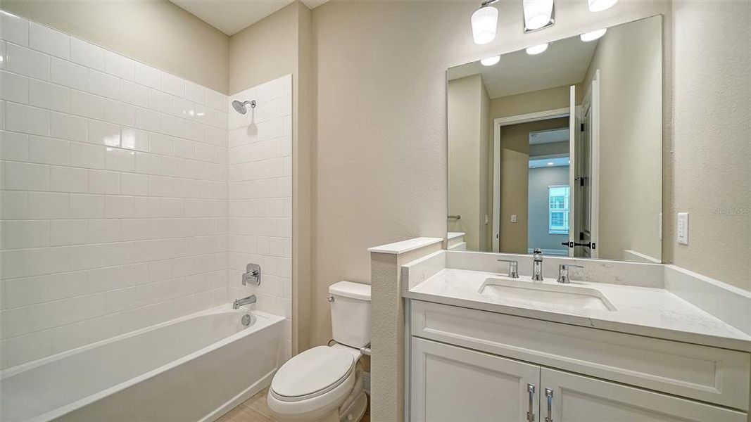 Furnished interior view inside a new home in Windward, Lakewood Ranch (Image 13).