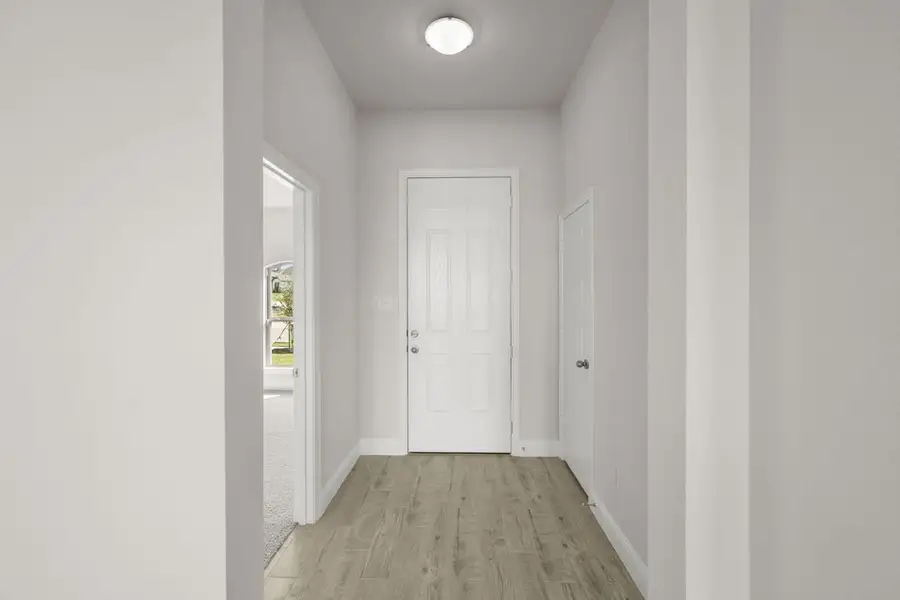 Front exterior of a new home in Still Water Lake, Godley, TX, highlighting curb appeal (Image 10). Front exterior of a new home in Still Water Lake, Godley, TX, highlighting curb appeal (Image 10).