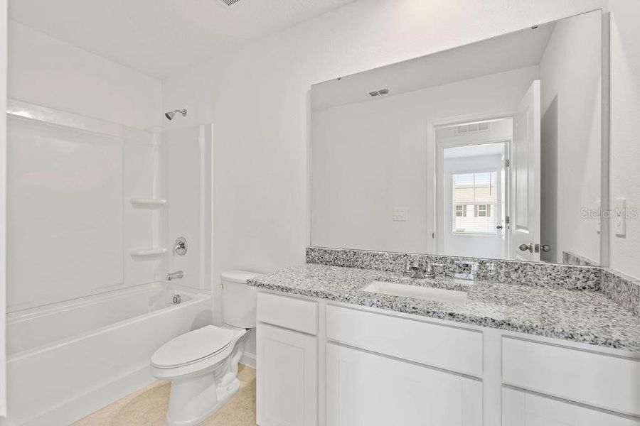 Furnished interior view inside a new home in , Davenport (Image 8).
