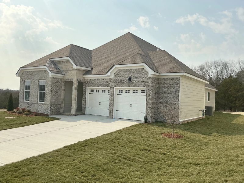 Front exterior of a new home in Willow Landing, Mount Juliet, TN, highlighting curb appeal (Image 18).