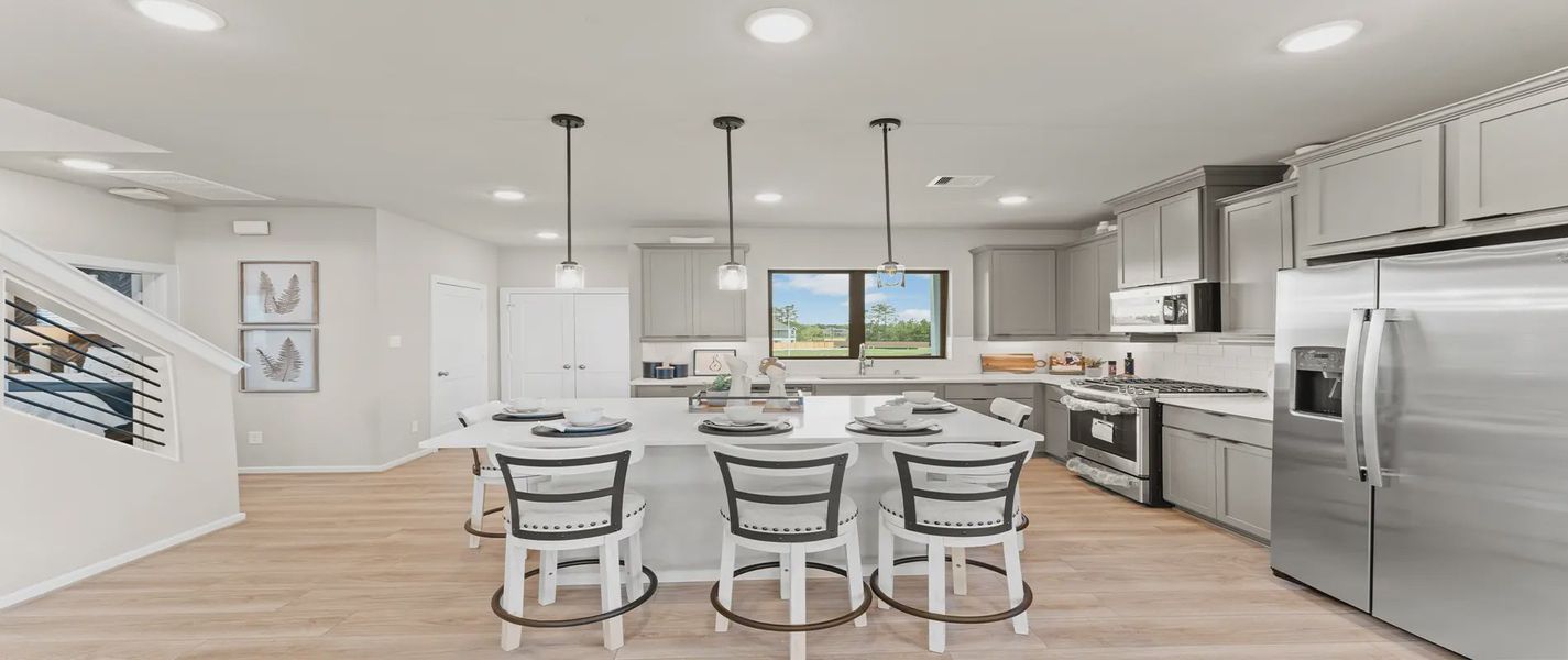 Representative furnished interior of a home built from the Hawkins by Chesmar Homes in Sienna Courtyard, Missouri City (Image 6).