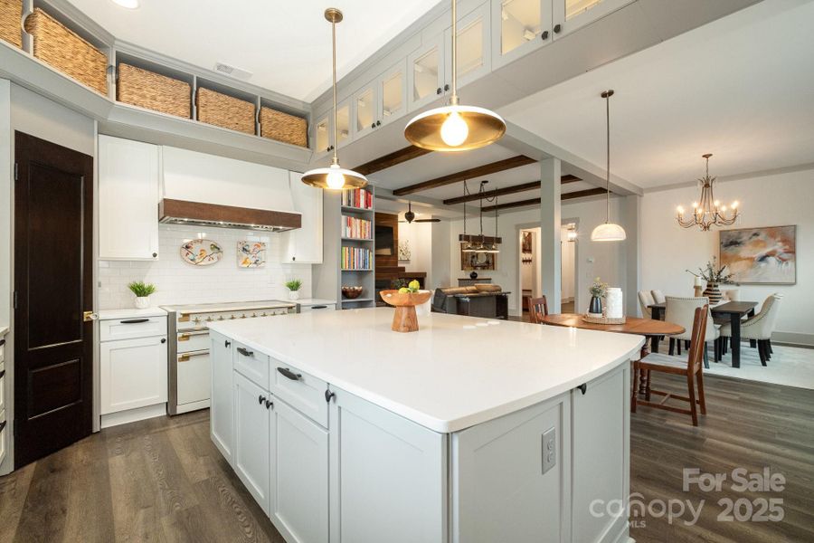 The chef can work and stay connected to the other spaces The chef can work and stay connected to the other spaces