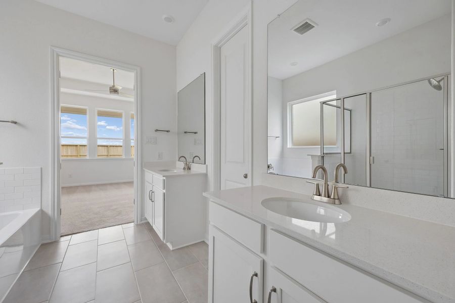 Primary bathroom. Sample product photo. Actual exterior and interior selections may vary by homesite. Photo may be virtually staged.