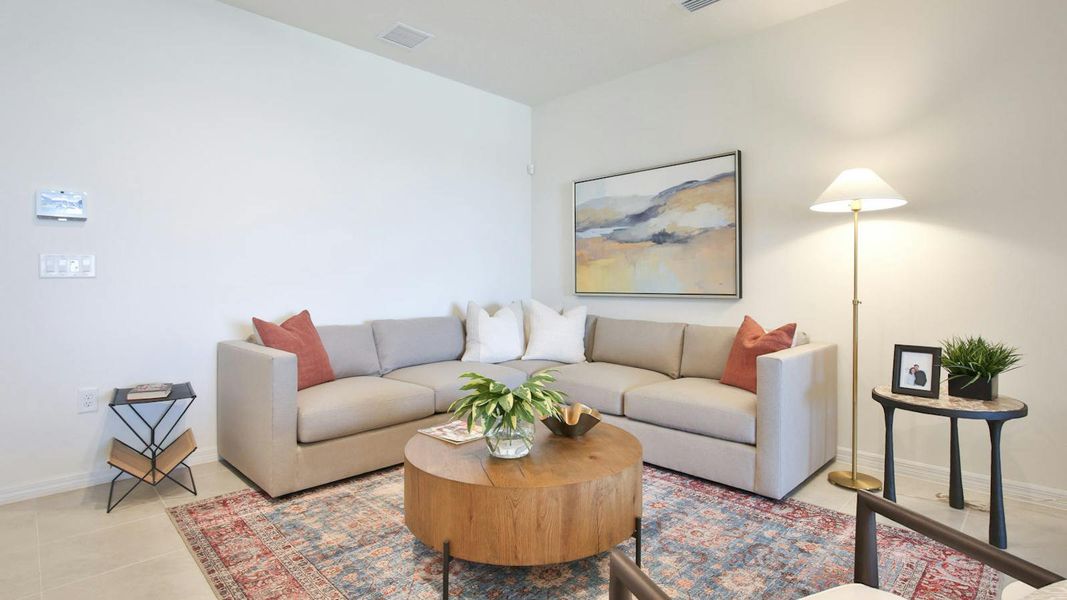 Furnished interior view inside a new home in Palm Grove Real Estate and Homes for Sale in Lakewood Ranch, FL - Neal Communities, Lakewood Ranch (Image 32).
