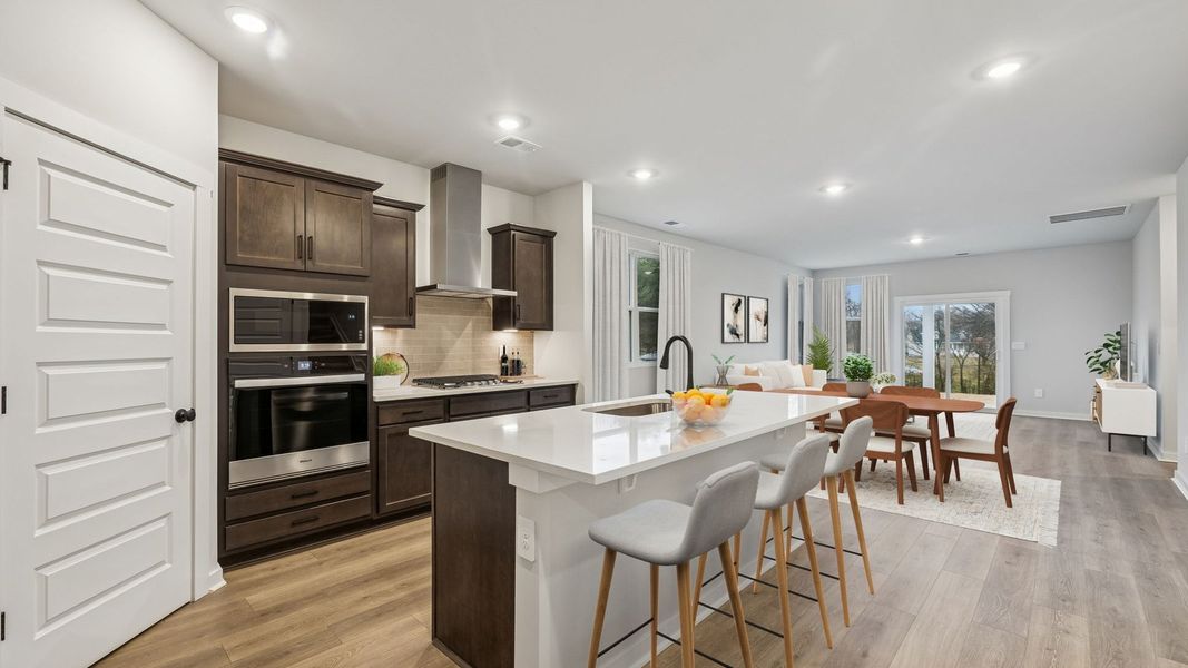 Representative furnished interior of a home built from the Dijon B by D.R. Horton in Harvest Point, Spring Hill (Image 6). Representative furnished interior of a home built from the Dijon B by D.R. Horton in Harvest Point, Spring Hill (Image 6).