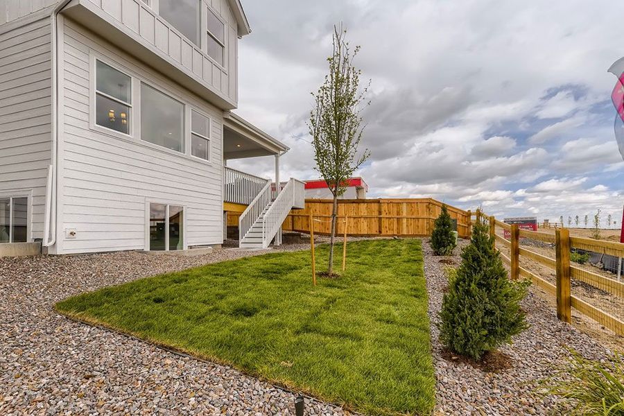 Representative exterior photo of a completed home built from the Ridgway by Taylor Morrison in The Fields at Looking Glass Town Collection, Parker, CO (Image 21).