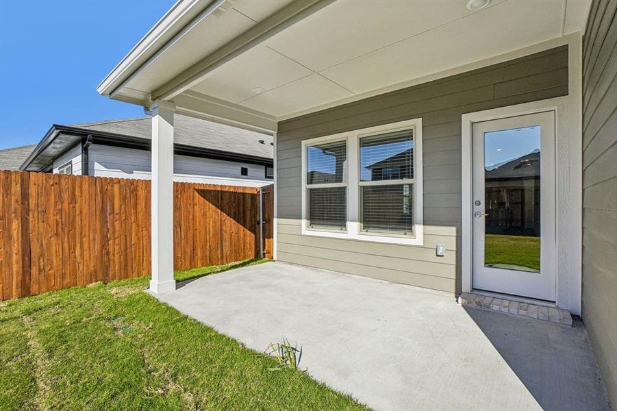 Exterior details and patio area of a home in Trails of Lavon - Spring Series, Lavon (Image 27).