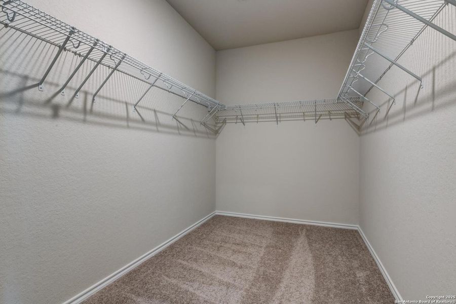 Spacious, unfurnished interior of a new home in Meadows at Hennersby Hollow 40's, San Antonio (Image 37).