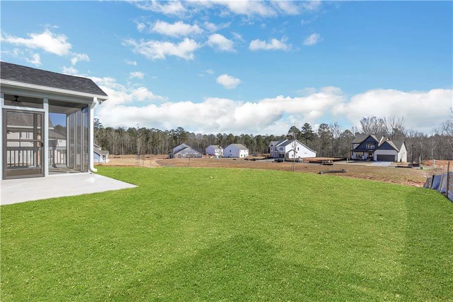 Exterior details and patio area of a home in Twin Lakes, Hoschton (Image 27).