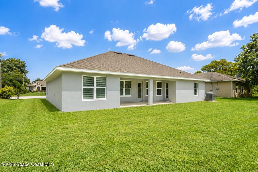 Exterior details and patio area of a home in Palm Bay, Palm Bay (Image 1). Exterior details and patio area of a home in Palm Bay, Palm Bay (Image 1).