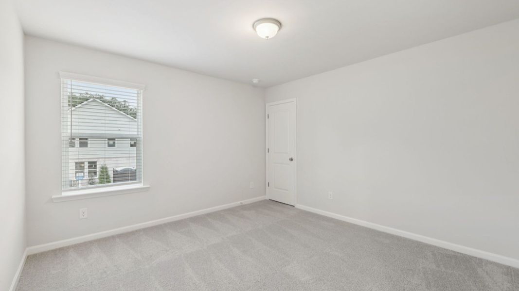 Furnished interior view inside a new home in Hamilton Lakes, Loganville (Image 26).
