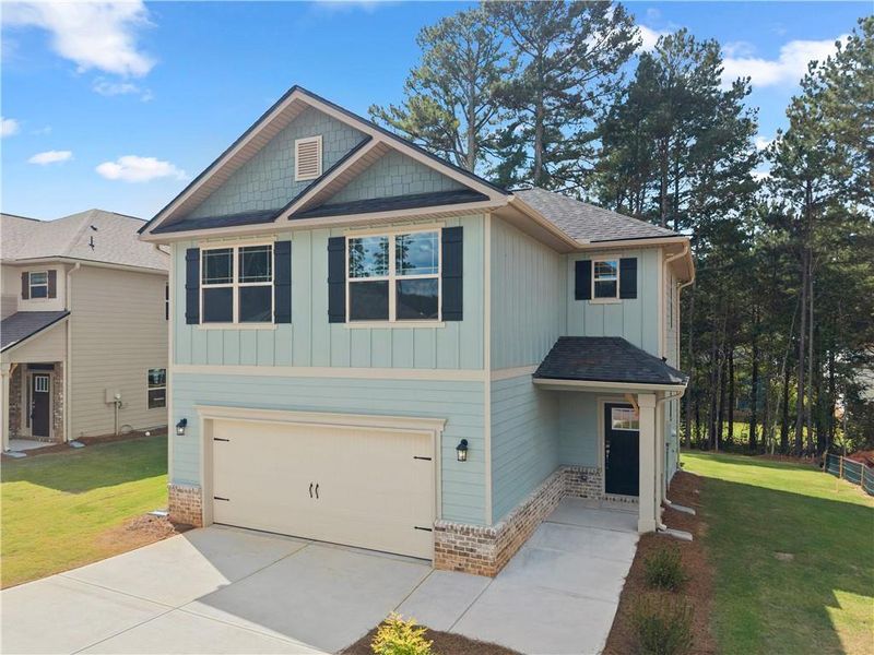 Front exterior of a new home in Magnolia Villas, Cornelia, GA, highlighting curb appeal (Image 22). Front exterior of a new home in Magnolia Villas, Cornelia, GA, highlighting curb appeal (Image 22).