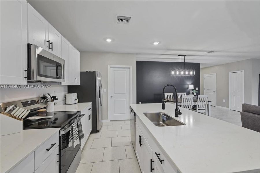 Furnished interior view inside a new home in , Lehigh Acres (Image 31).