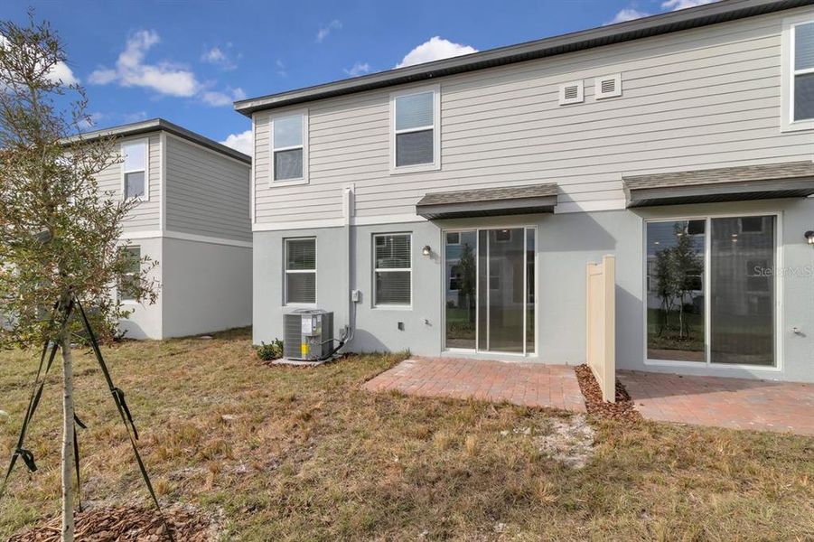 Exterior details and patio area of a home in , St. Cloud (Image 4).