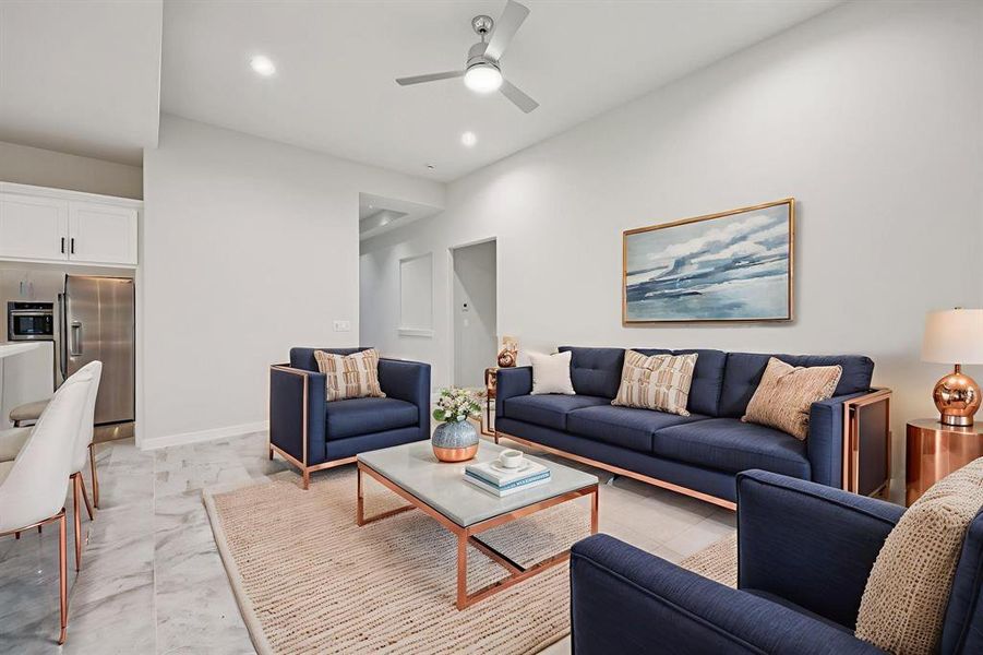 Virtually Staged Living room with light marble finish floors, a ceiling fan, and recessed lighting Virtually Staged Living room with light marble finish floors, a ceiling fan, and recessed lighting