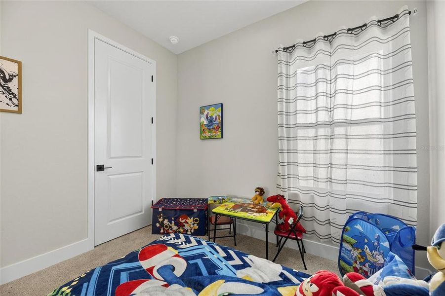 Furnished interior view inside a new home in The Peninsula at Rhodine Lake, Riverview (Image 32).