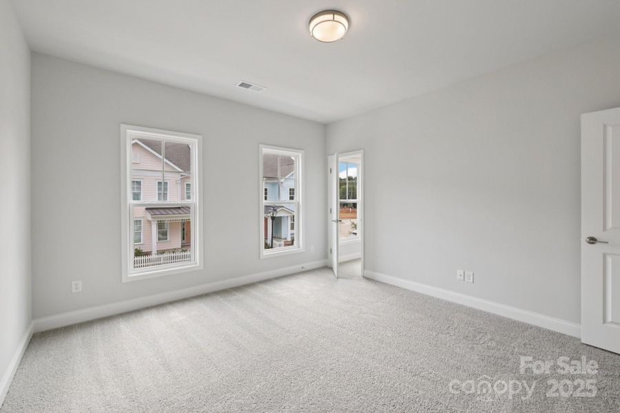 Spacious, unfurnished interior of a new home in Walk23, Huntersville (Image 35).