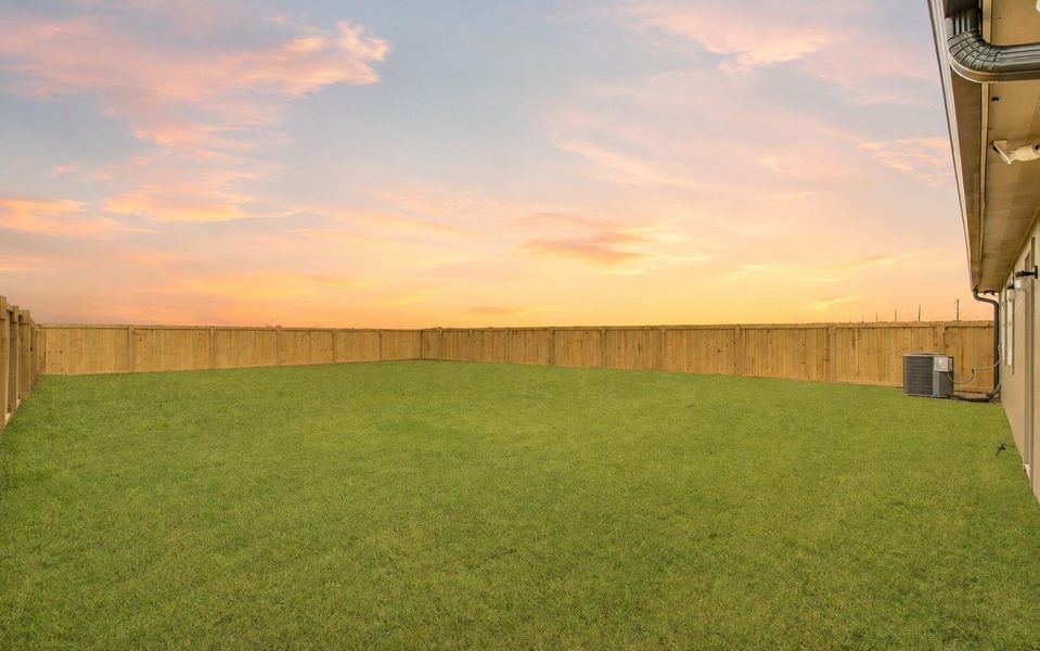 A spacious backyard ready for your personal touch. (Sky Virtually Enhanced)