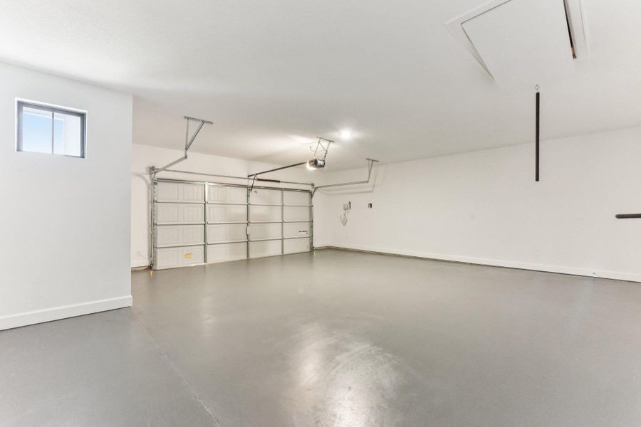 Garage with baseboards Garage with baseboards