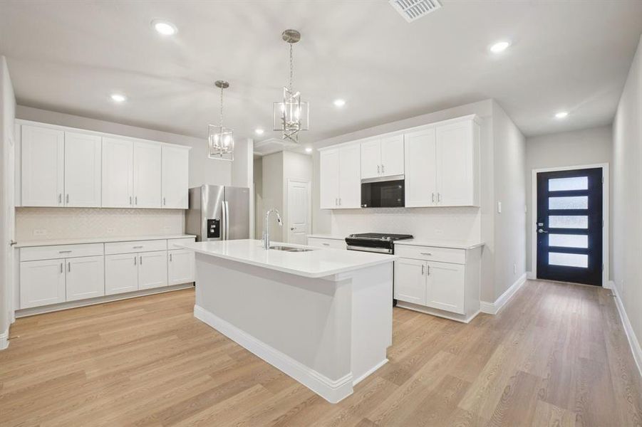 Furnished interior view inside a new home in Parks at Foster Crossing - Spring Series, Anna (Image 15).