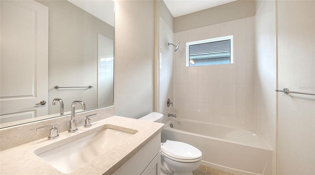 Furnished interior view inside a new home in Grand Park, Sarasota (Image 10).