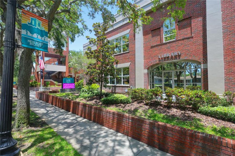 Front exterior of a new home in , New Port Richey, FL, highlighting curb appeal (Image 25).