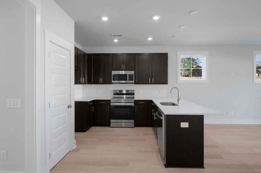 Furnished interior view inside a new home in Windward Townes, Goose Creek (Image 14).