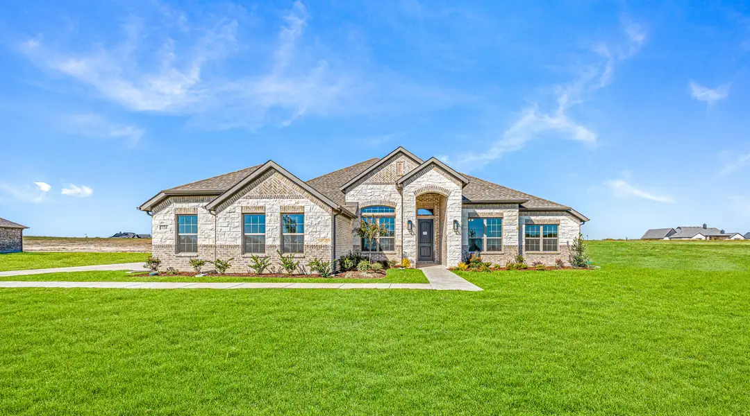 Front exterior of a new home in Berkshire Estates, Mesquite, TX, highlighting curb appeal (Image 1). Front exterior of a new home in Berkshire Estates, Mesquite, TX, highlighting curb appeal (Image 1).