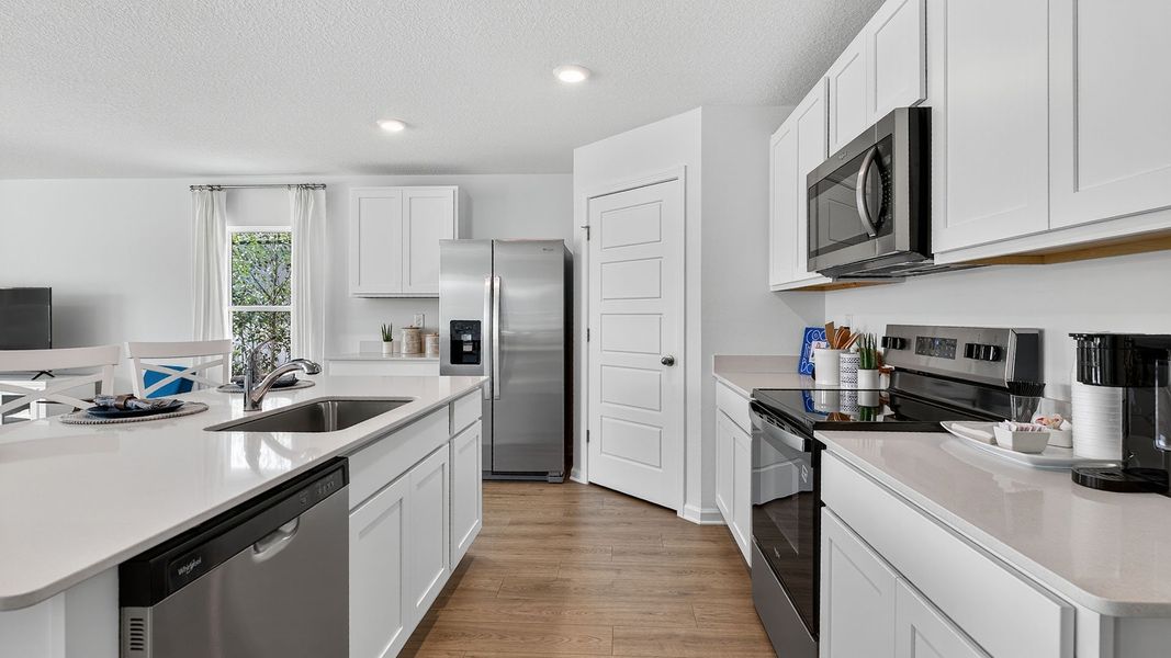 Representative furnished interior of a home built from the CALI by D.R. Horton in Sawmill Branch Express, Palm Coast (Image 6).