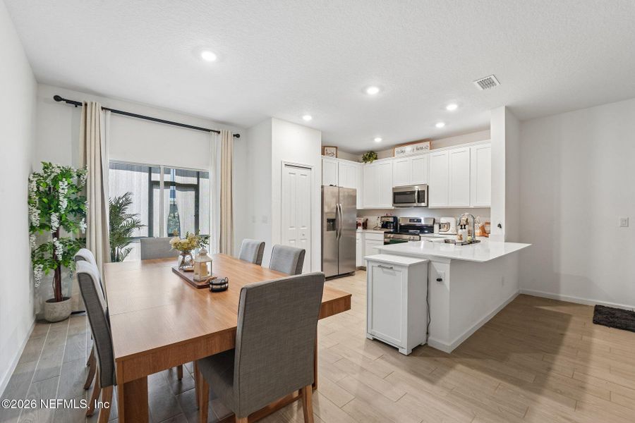 Furnished interior view inside a new home in Longbay Townhomes, Middleburg (Image 12).