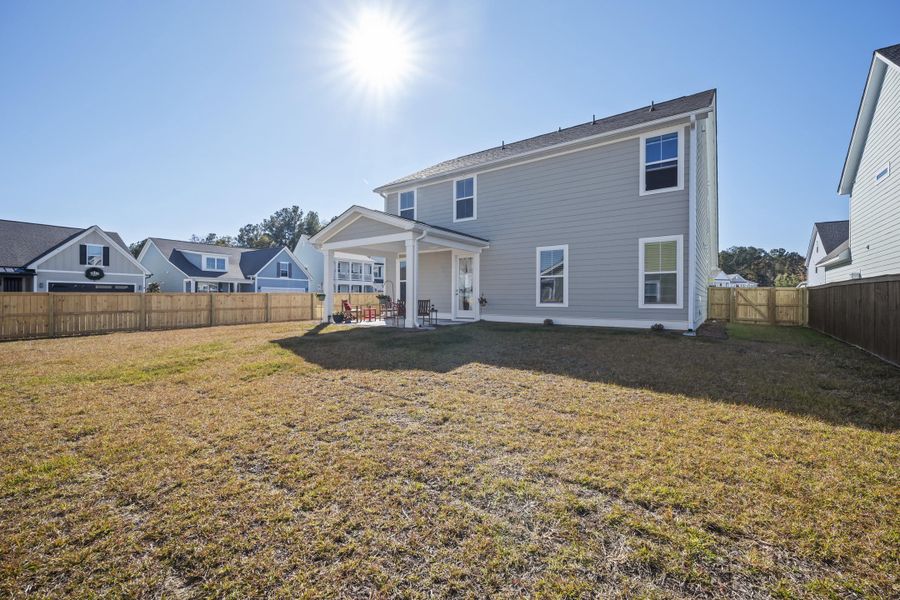 Exterior details and patio area of a home in High Point at Foxbank, Moncks Corner (Image 3).