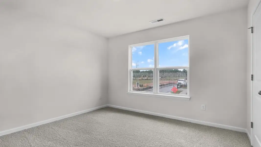 Spacious, unfurnished interior of a new home in The Reserve at Prestleigh, Wake Forest (Image 20).