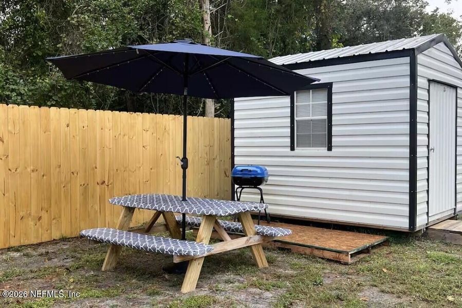 Exterior details and patio area of a home in , Satsuma (Image 22).