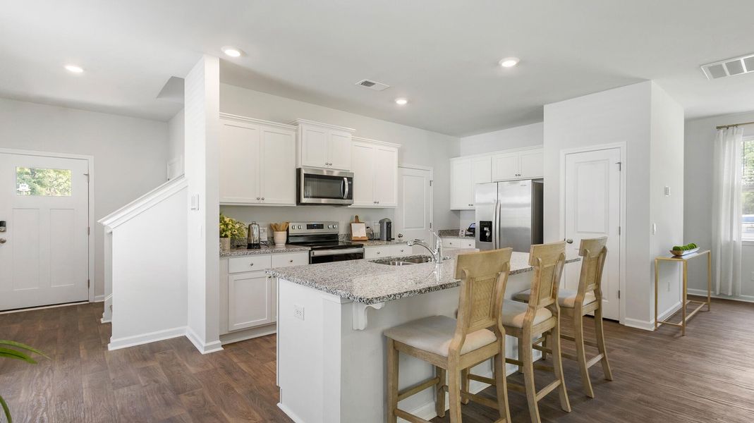 Furnished interior view inside a new home in Hillcrest, Ravenel (Image 8). Furnished interior view inside a new home in Hillcrest, Ravenel (Image 8).