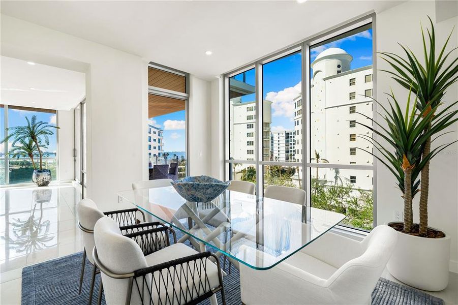 Balcony access through the dining room or stacking sliders.