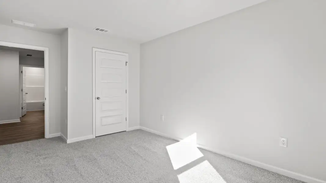 Spacious, unfurnished interior of a new home in Magnolia at the Bluffs Phase 3, Freeport (Image 16).