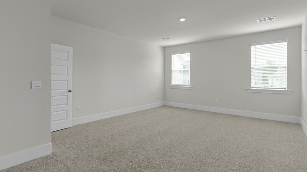 Spacious, unfurnished interior of a new home in Surfside Landing, Hubert (Image 26).