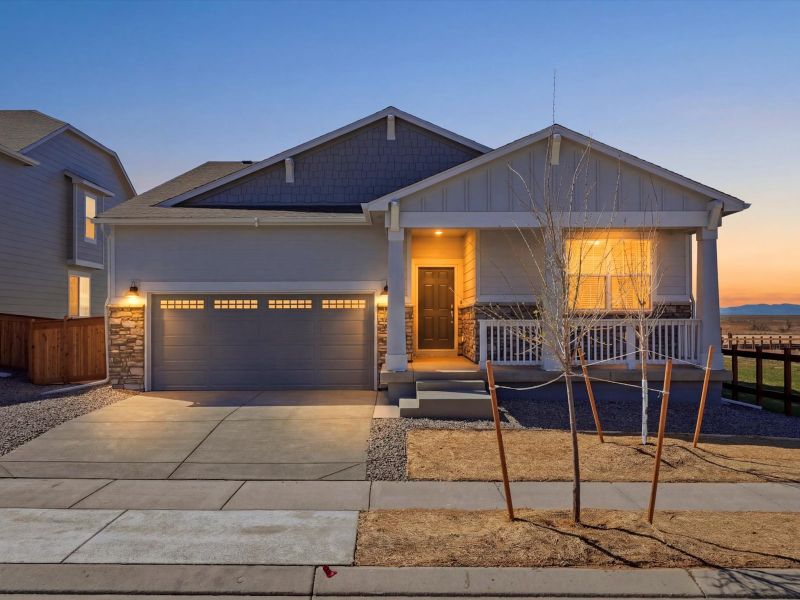 Front exterior of a new home in Buffalo Highlands: The Canyon Collection, Commerce City, CO, highlighting curb appeal (Image 1). Front exterior of a new home in Buffalo Highlands: The Canyon Collection, Commerce City, CO, highlighting curb appeal (Image 1).