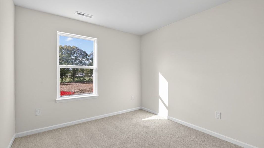 Spacious, unfurnished interior of a new home in The Townes at Honeycutt Oaks, Angier (Image 20).
