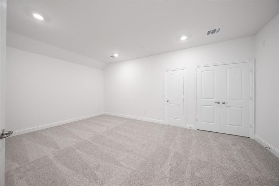 Spacious, unfurnished interior of a new home in Valencia on the Lake: Valencia 50s, Little Elm (Image 13). Spacious, unfurnished interior of a new home in Valencia on the Lake: Valencia 50s, Little Elm (Image 13).