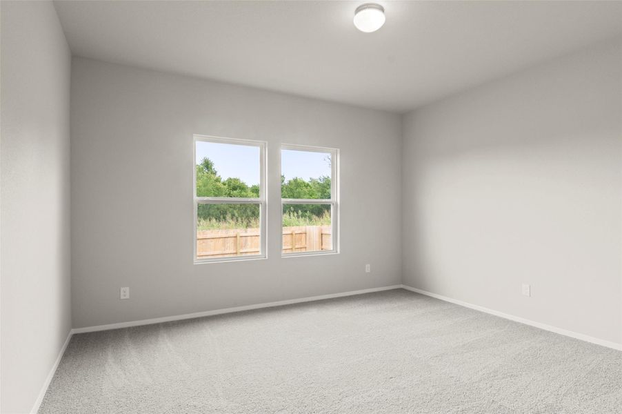 Unfurnished room featuring carpet flooring and baseboards