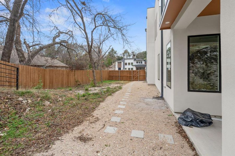 View of fenced backyard